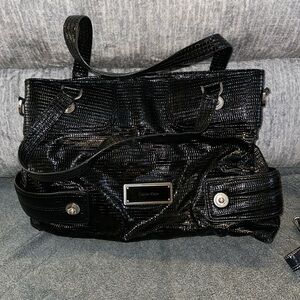 Calvin Klein large shoulder bag in faux leather. Versatile shoulder options-